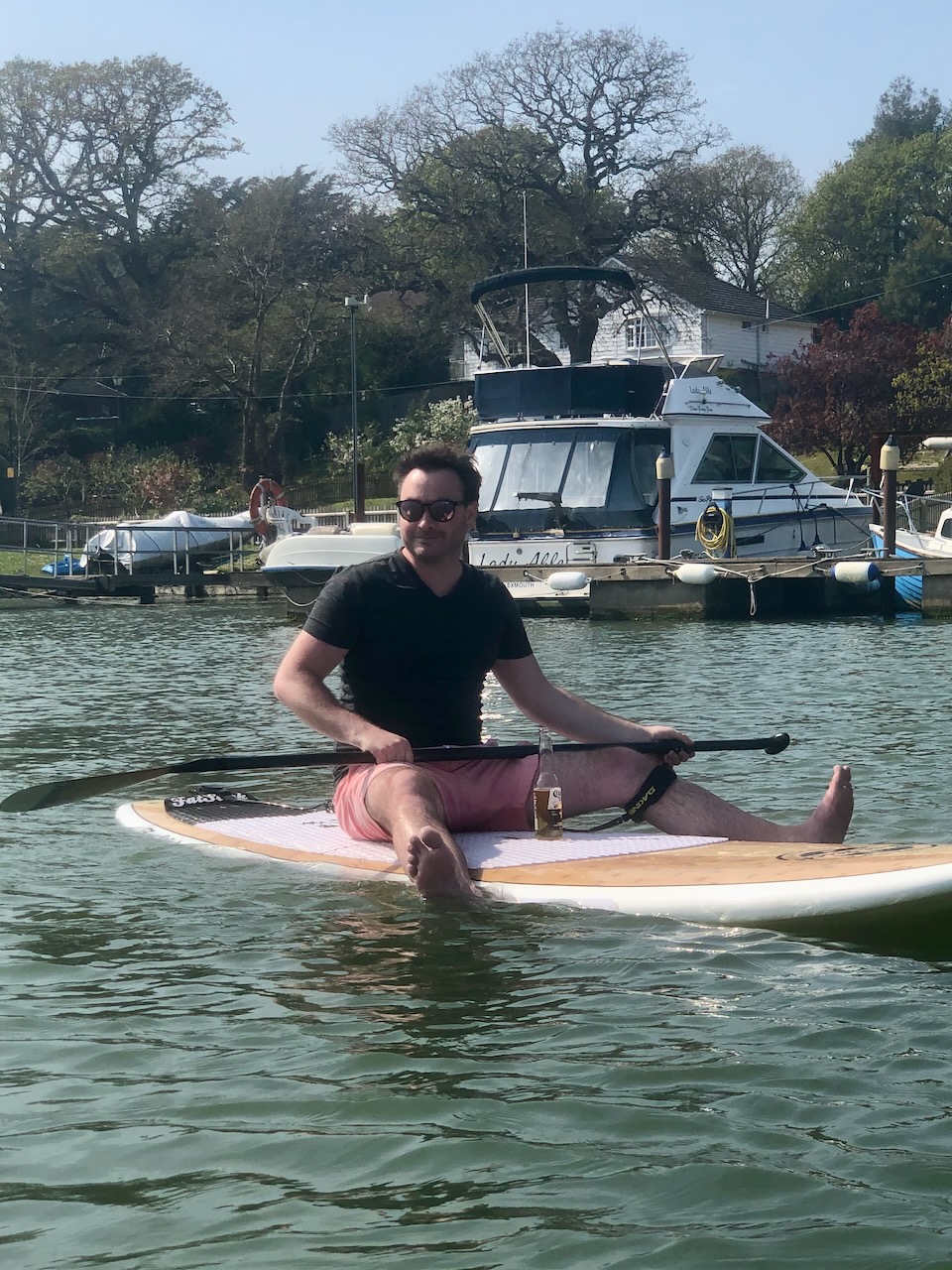 Photo of myself on a SUP as an informal photo. This isn't LinkedIn after all.